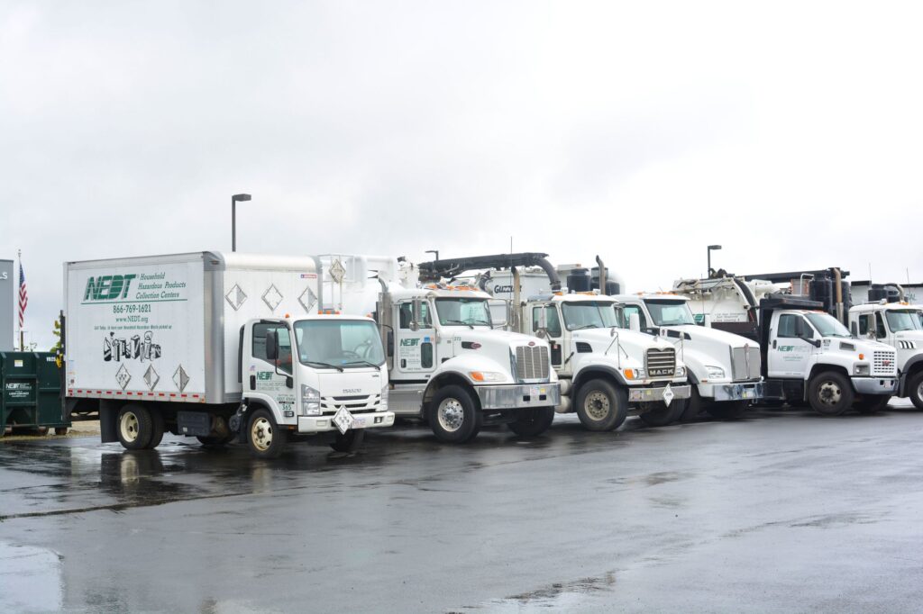 Fleet of NEDT Trucks for residential and commercial hazardous waste services.