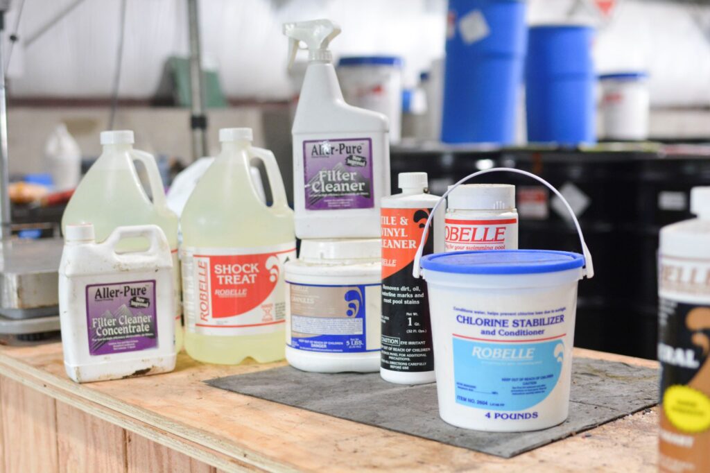 A collection of chlorine-based pool and cleaning products.