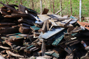 A pile of treated & lead paint wood after demolition.